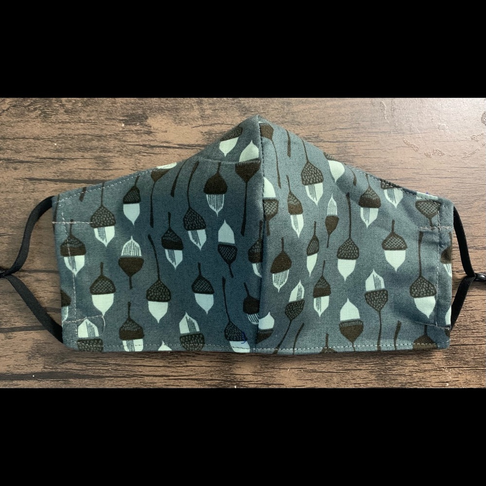 Fitted Acorns mask with adjustable ear loops , filter pocket and nose wire